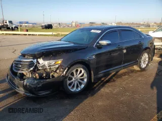 2014 Ford Taurus Limited с VIN 1FAHP2J82EG180438, выставлен на аукционе Copart как лот 77816914 с пробегом 130 311 миль миль и Чистый • Clean title. История ставок и продаж доступна на DreamBid. Изображение 1.