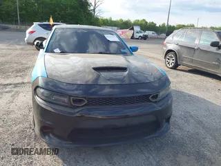 2015 Dodge Charger SXT with VIN 2C3CDXHG1FH848019, listed as a IAAI auction lot 42124399 with 175,247 mi miles and . Bid and sale history available at DreamBid. Image 11.