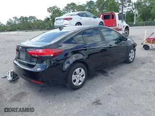2018 Kia Forte LX with VIN 3KPFK4A78JE227114, listed as a IAAI auction lot 41977992 with 63,327 mi miles. Bid and sale history available at carsss.com. Image 4.