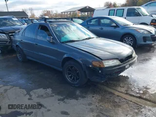 1997 Honda Accord EX with VIN 1HGCD565XVA049579, listed as a IAAI auction lot 40867933 with 189,191 mi miles and . Bid and sale history available at carsss.com. Image 1.