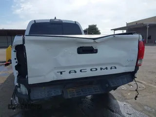 2017 Toyota Tacoma SR5 with VIN 3TMDZ5BN9HM029700, listed as a IAAI auction lot 42034375 with 86,907 mi miles. Bid and sale history available at carsss.com. Image 6.