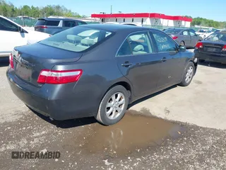 2007 Toyota Camry CE with VIN 4T1BE46K07U638516, listed as a IAAI auction lot 42128391 with 168,649 mi miles. Bid and sale history available at carsss.com. Image 4.