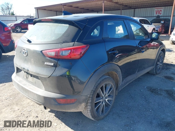 2018 Mazda CX-3 Touring with VIN JM1DKDC70J0325325, listed as a IAAI auction lot 40914334 with 63,978 mi miles. Bid and sale history available at carsss.com. Image 4.