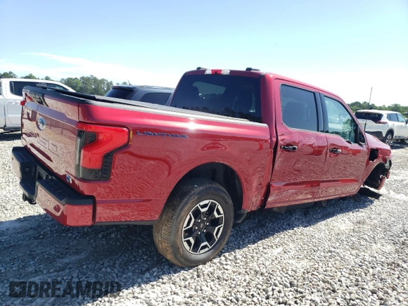 2023 Ford F-150 Lightning Pro z VIN 1FTVW1EL5PWG08844, wystawiony jako Copart lot #57673505 z przebiegiem 20 001 mil mil oraz Szkoda całkowita • Salvage title. Historia ofert i sprzedaży dostępna na DreamBid. Obrazek 3.