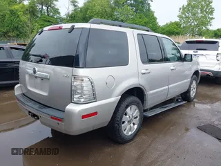 2006 Mercury Mountaineer Luxury z VIN 4M2EU47E06UJ24672, wystawiony jako IAAI lot #42277776 z przebiegiem 134 567 mil mil oraz . Historia ofert i sprzedaży dostępna na DreamBid. Obrazek 4.