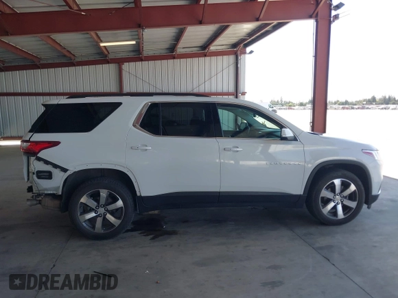2021 Chevrolet Traverse LT with VIN 1GNERHKW8MJ232171, listed as a IAAI auction lot 42269142 with 88,830 mi miles and . Bid and sale history available at DreamBid. Image 14.