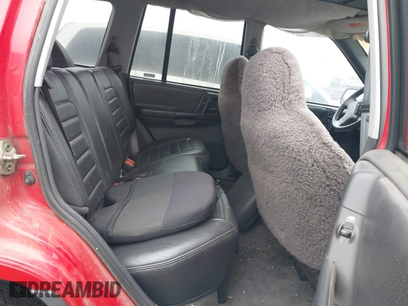 1996 Jeep Grand Cherokee Laredo with VIN 1J4GZ58Y3TC350926, listed as a IAAI auction lot 41224374 with 266,833 mi miles. Bid and sale history available at carsss.com. Image 8.