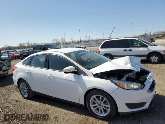 2017 Ford Focus SE with VIN 1FADP3F27HL320293, listed as a Copart auction lot 51782275 with 24,789 mi miles and Salvage title. Bid and sale history available at DreamBid. Image 4.