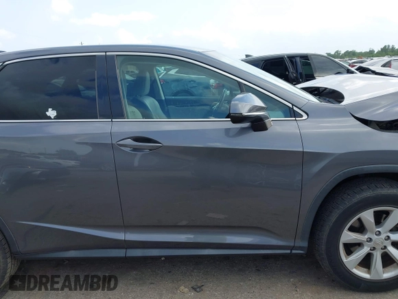 2016 Lexus RX 350 z VIN 2T2ZZMCA4GC032034, wystawiony jako IAAI lot #42095974 z przebiegiem 57 195 mil mil oraz . Historia ofert i sprzedaży dostępna na DreamBid. Obrazek 13.