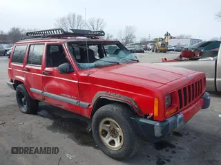 2000 Jeep Cherokee z VIN 1J4FF48S1YL143940, wystawiony jako IAAI lot #41336530 z przebiegiem 219 456 mil mil oraz . Historia ofert i sprzedaży dostępna na DreamBid. Obrazek 1.