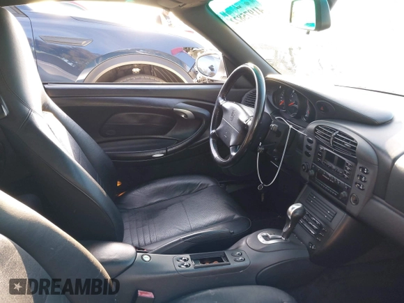 1999 Porsche 911 with VIN WP0CA2999XS652816, listed as a IAAI auction lot 41975822 with 291,258 mi miles and . Bid and sale history available at DreamBid. Image 5.