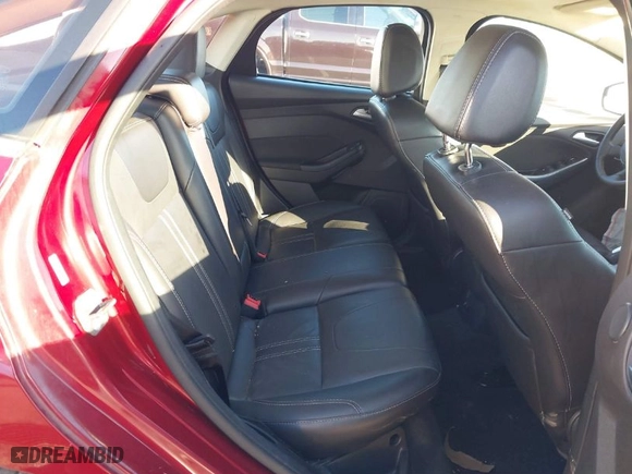 2014 Ford Focus Titanium with VIN 1FADP3J23EL137525, listed as a IAAI auction lot 41562684 with 127,104 mi miles. Bid and sale history available at carsss.com. Image 8.