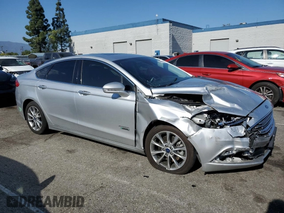 2017 Ford Fusion Titanium with VIN 3FA6P0SU0HR350946, listed as a Copart auction lot 54957885 with Not Provided miles and Clean Title. Bid and sale history available at DreamBid. Image 4.