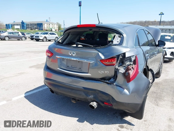 2015 Infiniti QX70 with VIN JN8CS1MW1FM481233, listed as a IAAI auction lot 41976458 with 134,875 mi miles and . Bid and sale history available at DreamBid. Image 6.