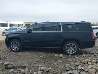 2016 GMC Yukon XL Denali with VIN 1GKS2HKJ2GR128323, listed as a IAAI auction lot 41776970 with 179,270 mi miles and . Bid and sale history available at carsss.com. Image 14.