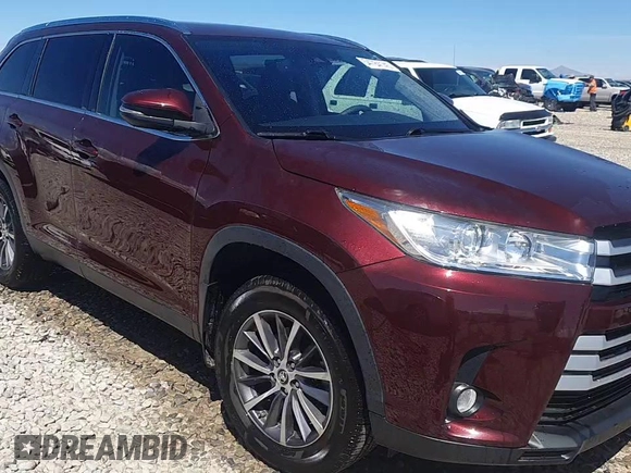 2019 Toyota Highlander SE z VIN 5TDJZRFH2KS988314, wystawiony jako Copart lot #54784145 z przebiegiem 57 851 mil mil oraz Szkoda całkowita • Salvage title. Historia ofert i sprzedaży dostępna na DreamBid. Obrazek 14.