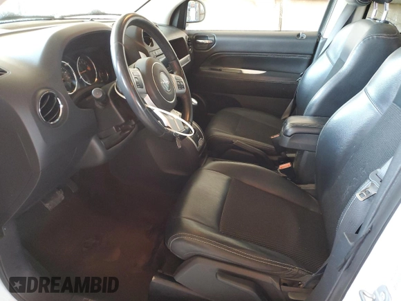 2016 Jeep Compass Latitude z VIN 1C4NJCEAXGD633548, wystawiony jako Copart lot #59866875 z przebiegiem 193 695 mil mil oraz Szkoda całkowita • Salvage title. Historia ofert i sprzedaży dostępna na DreamBid. Obrazek 7.