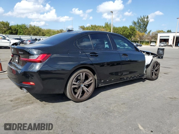 2023 BMW 3 Series 330i with VIN 3MW69FF05P8D21152, listed as a Copart auction lot 48803345 with 21,146 mi miles and Salvage title. Bid and sale history available at DreamBid. Image 3.