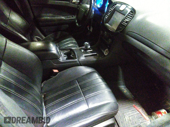 2014 Chrysler 300 S with VIN 2C3CCABG2EH343503, listed as a IAAI auction lot 40934463 with 128,876 mi miles and . Bid and sale history available at carsss.com. Image 5.