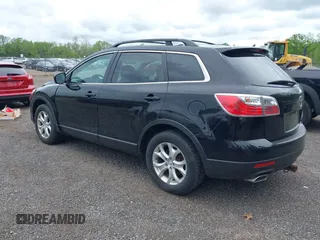2011 Mazda CX-9 Touring z VIN JM3TB3CV6B0324256, wystawiony jako IAAI lot #42245746 z przebiegiem 128 420 mil mil oraz . Historia ofert i sprzedaży dostępna na DreamBid. Obrazek 3.