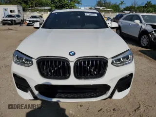 2021 BMW X4 xDrive30i with VIN 5UX2V1C0XM9E11002, listed as a Copart auction lot 67348653 with 27,805 mi miles. Bid and sale history available at carsss.com. Image 5.