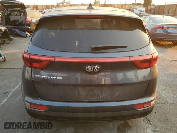2019 Kia Sportage LX with VIN KNDPM3AC7K7595663, listed as a Copart auction lot 87971845 with Not Provided miles and Salvage Title. Bid and sale history available at carsss.com. Image 6.