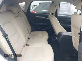 2017 Mazda CX-5 Touring z VIN JM3KFBCL5H0128584, wystawiony jako IAAI lot #42354669 z przebiegiem 56 563 mil mil oraz . Historia ofert i sprzedaży dostępna na DreamBid. Obrazek 8.
