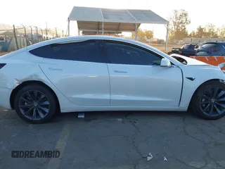 2020 Tesla Model 3 Performance with VIN 5YJ3E1EC1LF602516, listed as a IAAI auction lot 41841216 with 28,967 mi miles and . Bid and sale history available at DreamBid. Image 13.