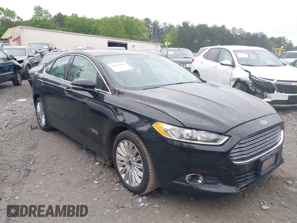 2016 Ford Fusion Energi SE Luxury with VIN 3FA6P0PU7GR293099, listed as a IAAI auction lot 42079873 with 194,755 mi miles. Bid and sale history available at carsss.com. Image 1.