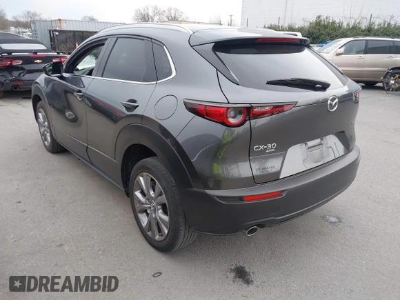 2022 Mazda CX-30 S Premium with VIN 3MVDMBDL9NM434619, listed as a IAAI auction lot 41620655 with 46,557 mi miles and . Bid and sale history available at carsss.com. Image 3.