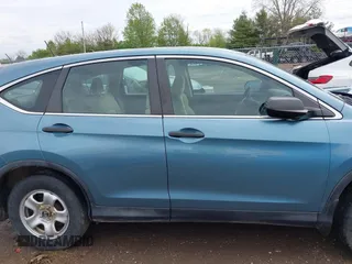2015 Honda CR-V LX with VIN 2HKRM4H37FH601922, listed as a IAAI auction lot 42126743 with 165,764 mi miles and . Bid and sale history available at DreamBid. Image 13.
