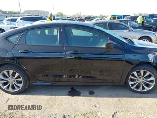 2015 Chrysler 200 S with VIN 1C3CCCBB8FN696188, listed as a IAAI auction lot 41978934 with 107,512 mi miles and . Bid and sale history available at DreamBid. Image 13.