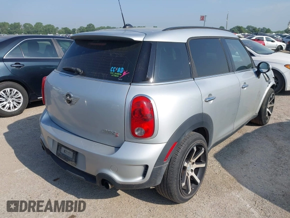 2013 MINI Countryman S z VIN WMWZC3C59DWP22638, wystawiony jako IAAI lot #42327540 z przebiegiem 155 060 mil mil oraz . Historia ofert i sprzedaży dostępna na DreamBid. Obrazek 4.