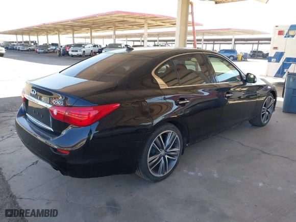 2014 Infiniti Q50 Premium with VIN JN1BV7AP9EM688811, listed as a IAAI auction lot 41483058 with 95,204 mi miles. Bid and sale history available at carsss.com. Image 4.