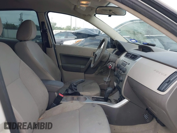 2010 Ford Focus S with VIN 1FAHP3EN0AW237869, listed as a IAAI auction lot 41949697 with 133,107 mi miles. Bid and sale history available at carsss.com. Image 5.