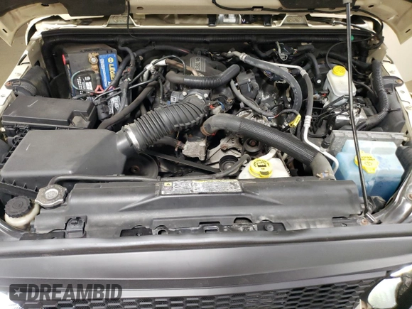 2011 Jeep Wrangler Sahara with VIN 1J4AA5D19BL577347, listed as a Copart auction lot 80340124 with 148,986 mi miles and Salvage Title. Bid and sale history available at DreamBid. Image 11.