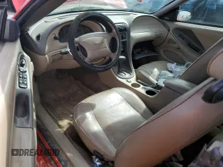 2003 Ford Mustang Deluxe z VIN 1FAFP44403F407589, wystawiony jako Copart lot #54002265 z przebiegiem 176 019 mil mil oraz Nie do naprawy • Non repairable. Historia ofert i sprzedaży dostępna na DreamBid. Obrazek 8.