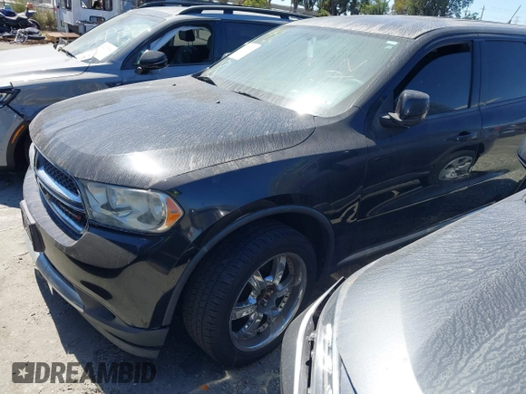 2013 Dodge Durango SXT with VIN 1C4RDHAG2DC673236, listed as a IAAI auction lot 42506024 with 198,215 mi miles and . Bid and sale history available at DreamBid. Image 21.