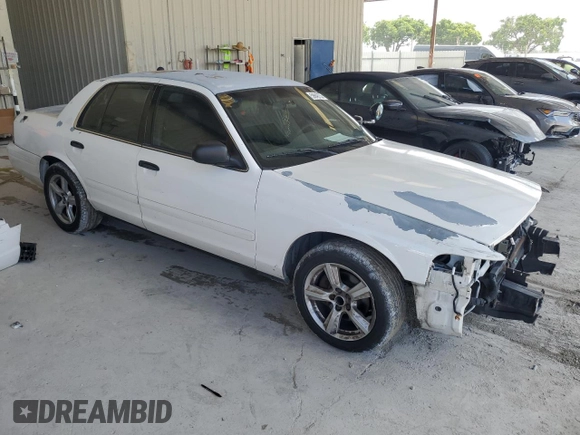 2005 Ford Police Interceptor с VIN 2FAFP71W15X134743, выставлен на аукционе Copart как лот 59949735 с пробегом 131 984 миль миль и Списание • Salvage title. История ставок и продаж доступна на DreamBid. Изображение 4.