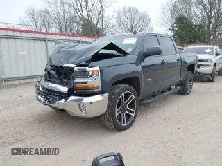 2018 Chevrolet Silverado 1500 LT with VIN 3GCPCREC1JG497019, listed as a IAAI auction lot 41459936 with 52,691 mi miles and . Bid and sale history available at DreamBid. Image 17.