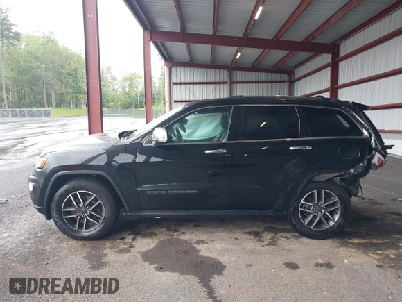 2021 Jeep Grand Cherokee Limited with VIN 1C4RJFBG2MC754779, listed as a IAAI auction lot 42293110 with 64,821 mi miles and . Bid and sale history available at DreamBid. Image 14.