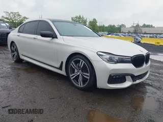 2017 BMW 7 Series 740i with VIN WBA7E2C57HG740101, listed as a IAAI auction lot 42209006 with 117,175 mi miles and . Bid and sale history available at DreamBid. Image 1.