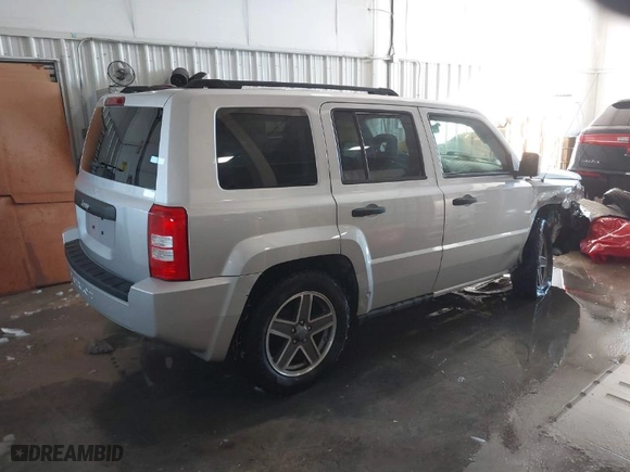 2009 Jeep Patriot Sport with VIN 1J4FT28BX9D160194, listed as a IAAI auction lot 41253940 with 104,339 mi miles. Bid and sale history available at carsss.com. Image 4.