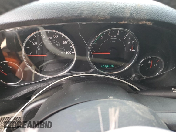 2012 Jeep Wrangler Unlimited Sport z VIN 1C4BJWDG4CL243538, wystawiony jako Copart lot #58826675 z przebiegiem 126 646 mil mil oraz Szkoda całkowita • Salvage title. Historia ofert i sprzedaży dostępna na DreamBid. Obrazek 9.