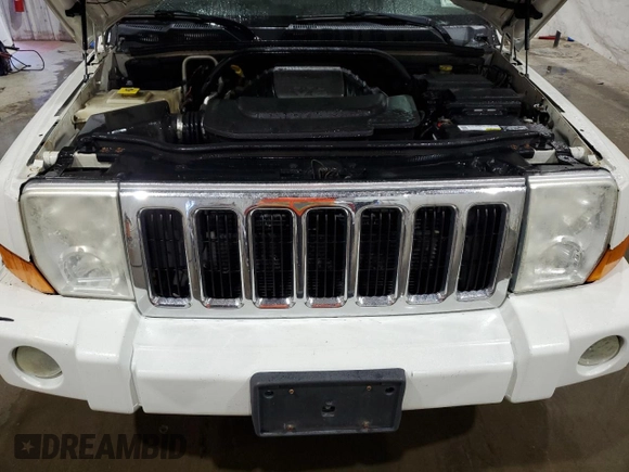 2010 Jeep Commander Limited z VIN 1J4RG5GTXAC109320, wystawiony jako Copart lot #70636104 z przebiegiem 160 011 mil mil oraz Szkoda całkowita • Salvage title. Historia ofert i sprzedaży dostępna na DreamBid. Obrazek 12.