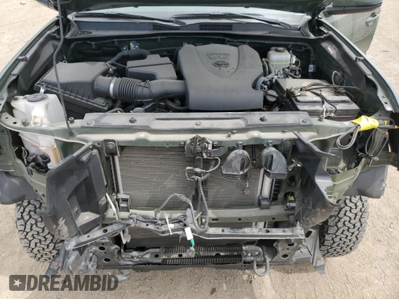 2022 Toyota Tacoma SR with VIN 3TMCZ5AN3NM511541, listed as a Copart auction lot 56299195 with 33,427 mi miles and Salvage title. Bid and sale history available at DreamBid. Image 11.