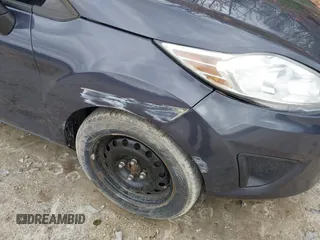 2012 Ford Fiesta SE with VIN 3FADP4BJ3CM152310, listed as a IAAI auction lot 42028398 with 124,530 mi miles and . Bid and sale history available at DreamBid. Image 6.