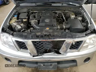 2010 Nissan Frontier SE with VIN 1N6AD0CW0AC429029, listed as a Copart auction lot 52036995 with 180,166 mi miles and Salvage title. Bid and sale history available at DreamBid. Image 11.