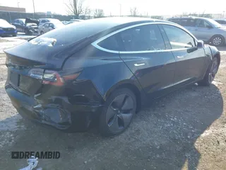 2020 Tesla Model 3 Standard Range Plus z VIN 5YJ3E1EA6LF662080, wystawiony jako IAAI lot #41410445 z przebiegiem Nie podano mil oraz . Historia ofert i sprzedaży dostępna na DreamBid. Obrazek 4.