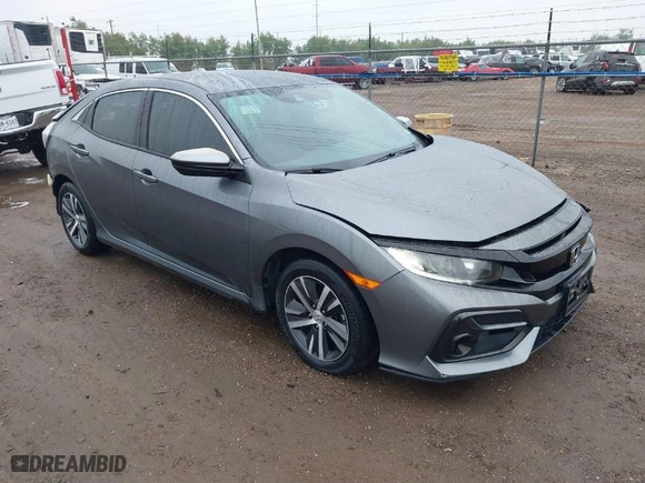 2020 Honda Civic Hatchback LX with VIN SHHFK7H31LU207819, listed as a IAAI auction lot 41323465 with 43,713 mi miles. Bid and sale history available at carsss.com. Image 1.